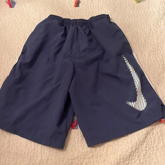 Nike Dri Fit Shorts Color Blue with White Swoosh - Picture 1 of 6